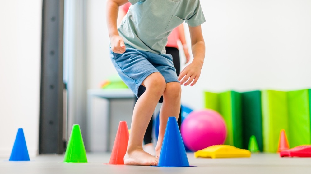 Banner da matéria Coordenação motora infantil: quando a dificuldade do seu filho merece atenção profissional?
